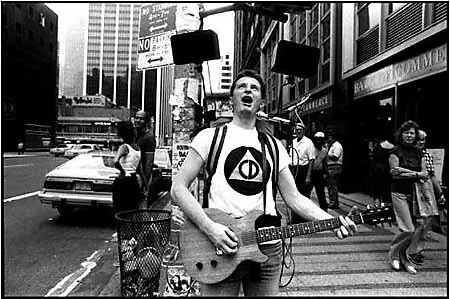 Billy Bragg playing his "porta-stack," NYC, 1980s
